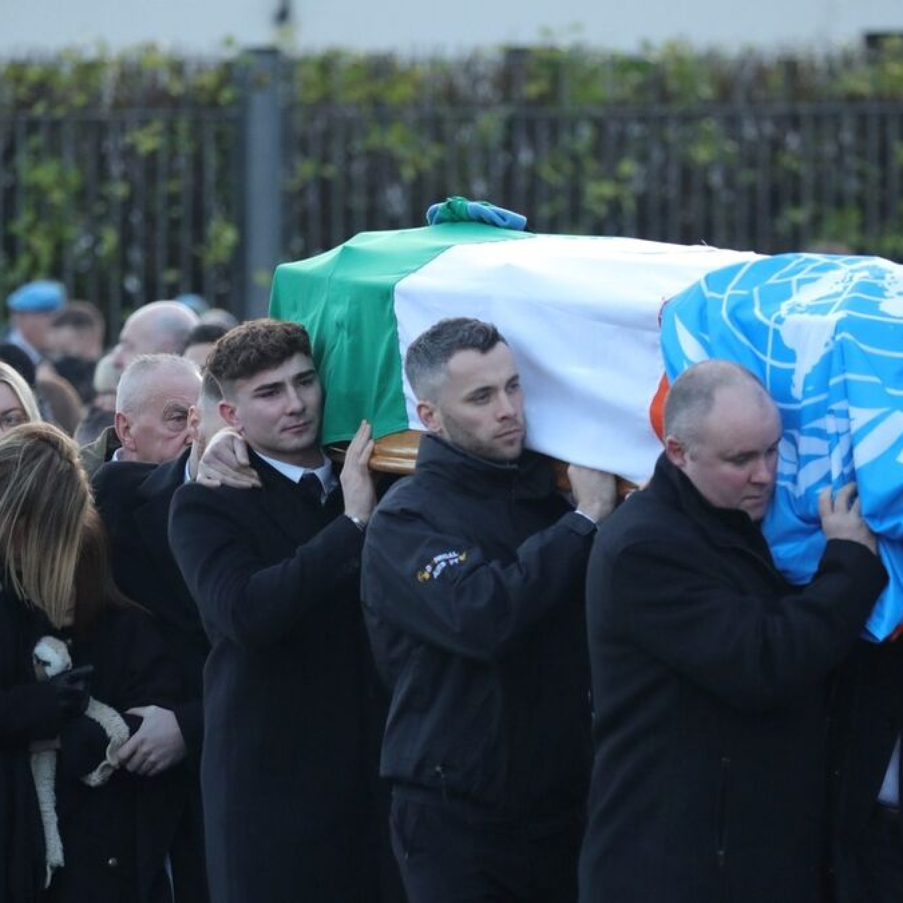 Both the Irish and UN flags were used to cover Pte Rooney's coffin