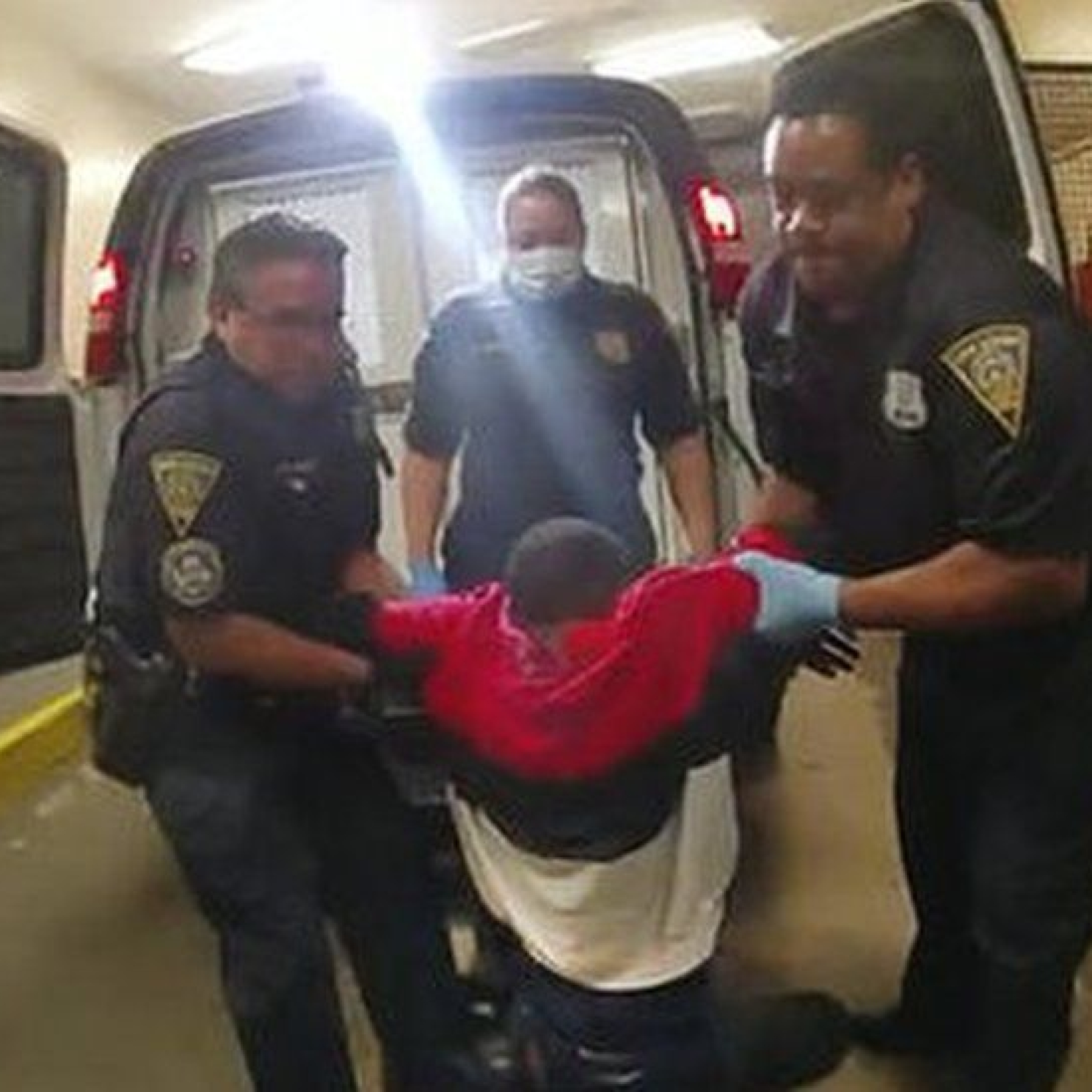 Officers charged after black man paralysed in van