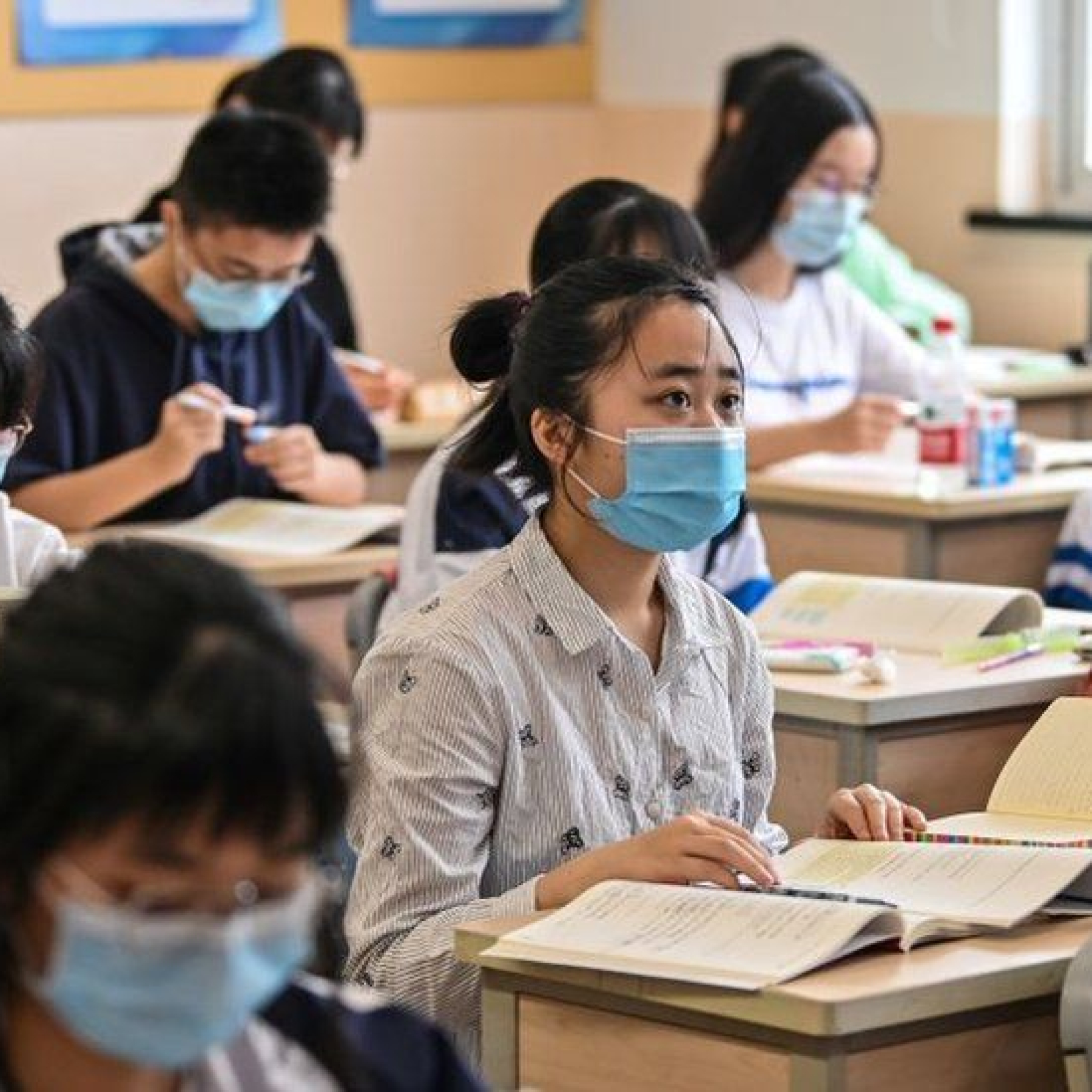 Students pictured in a school classroom in Shanghai in 2020