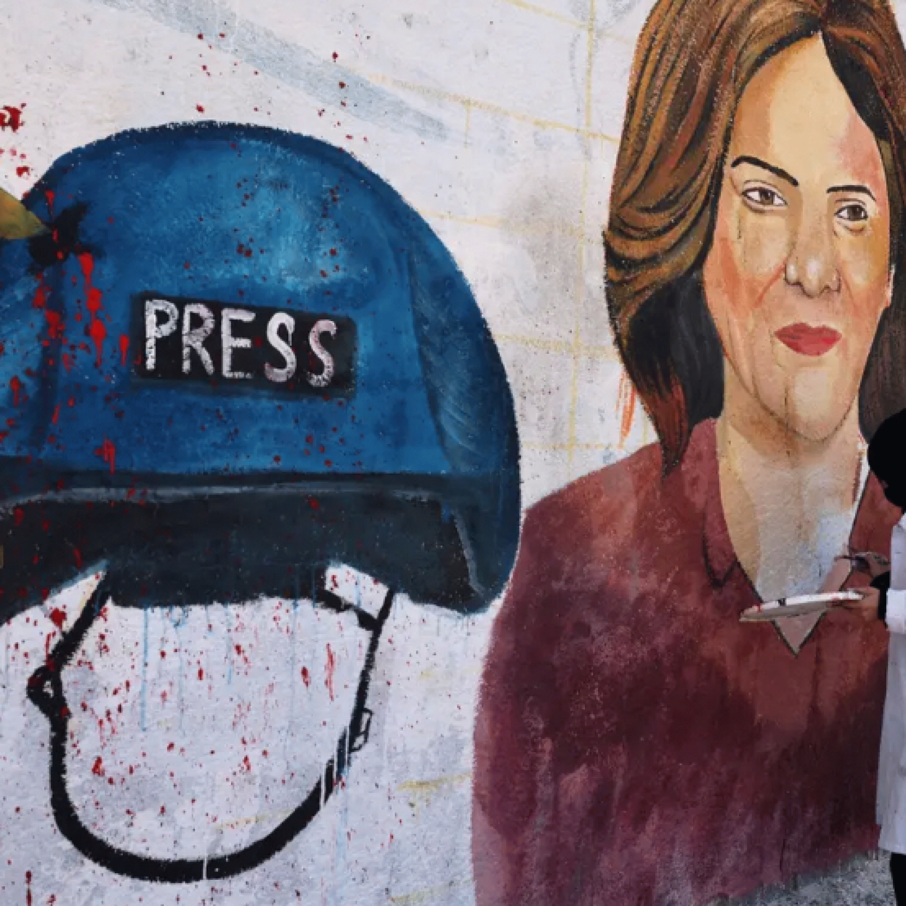 Family of journalist killed in West Bank lashes out at Biden