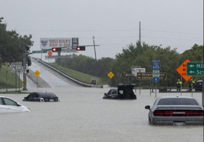 Heavy rain floods streets across the Dallas-Fort Worth area