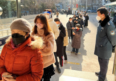 There are long queues at offices issuing passports and permits to travel to Hong Kong