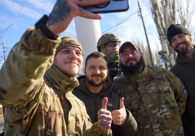 President Zelensky with soldiers on Monday