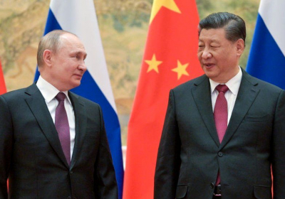 _123130318_putinbeijing
