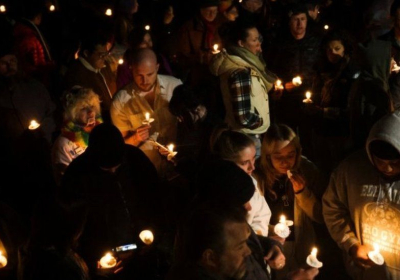 Hundreds of mourners held a vigil in Colorado Springs on Sunday night