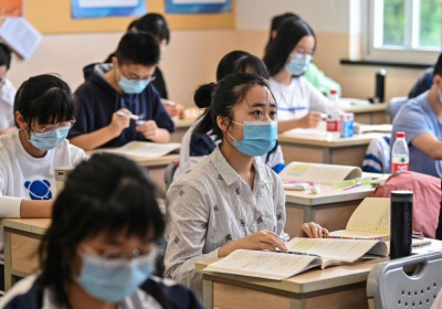 Students pictured in a school classroom in Shanghai in 2020